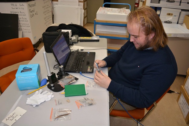 Figure 1: The author diligently recording measurements at the Prince of Wales Northern Heritage Centre (Yellowknife, NWT, Canada) in December 2016.